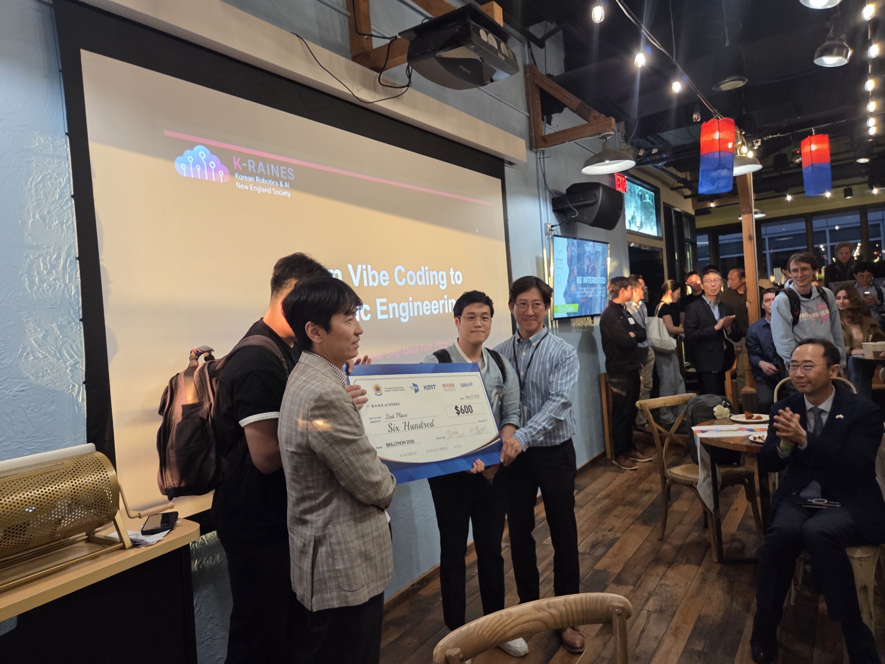 Skillthon 2026 top winners group photo with checks
